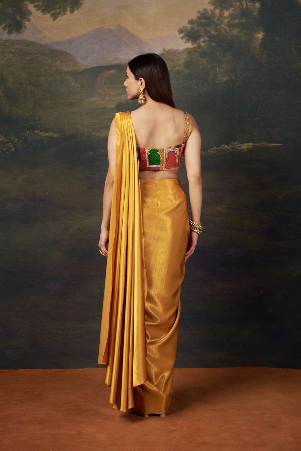 Hand embroidered blouse with pre draped liquid gold saree image 6