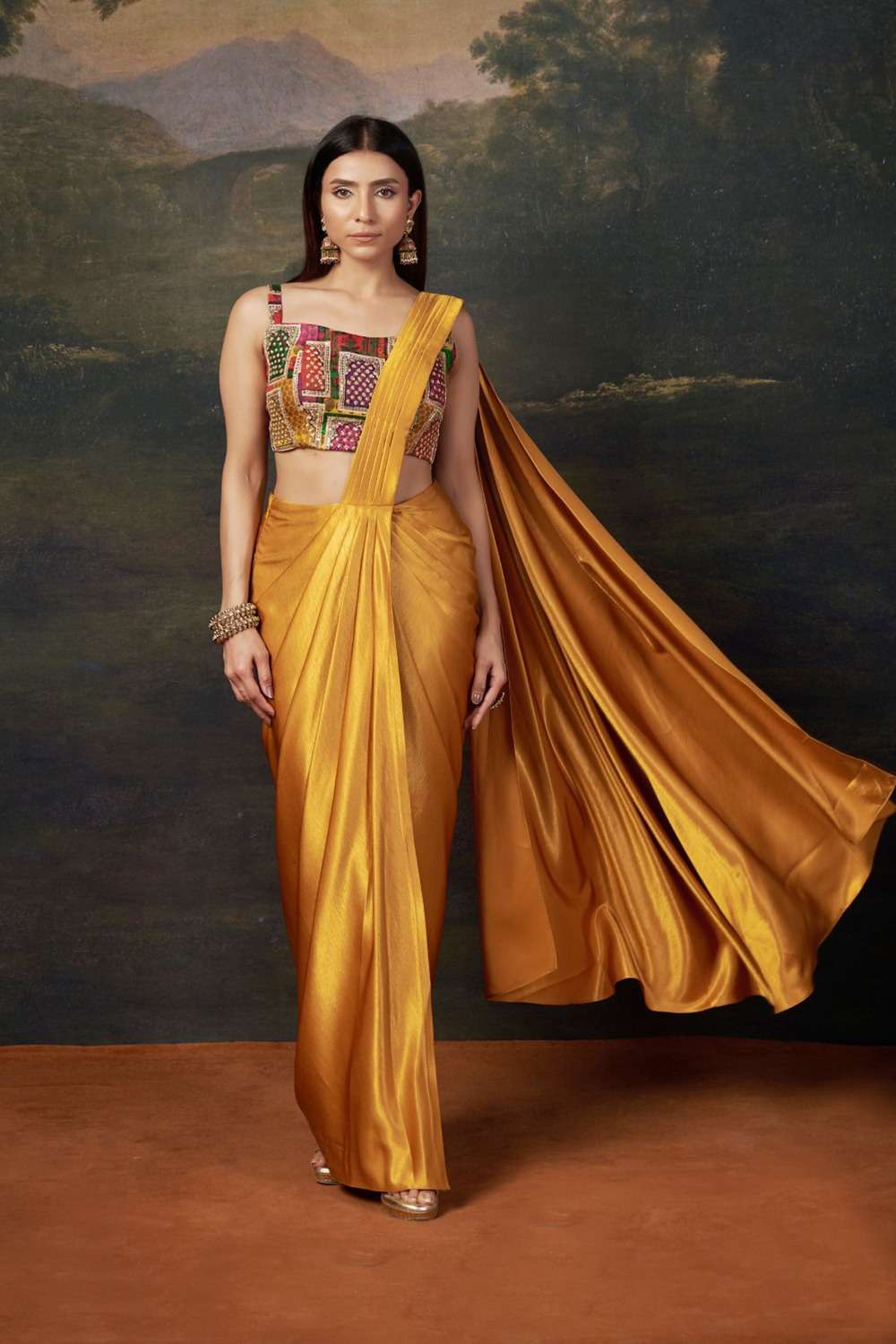 Hand embroidered blouse with pre draped liquid gold saree image 0