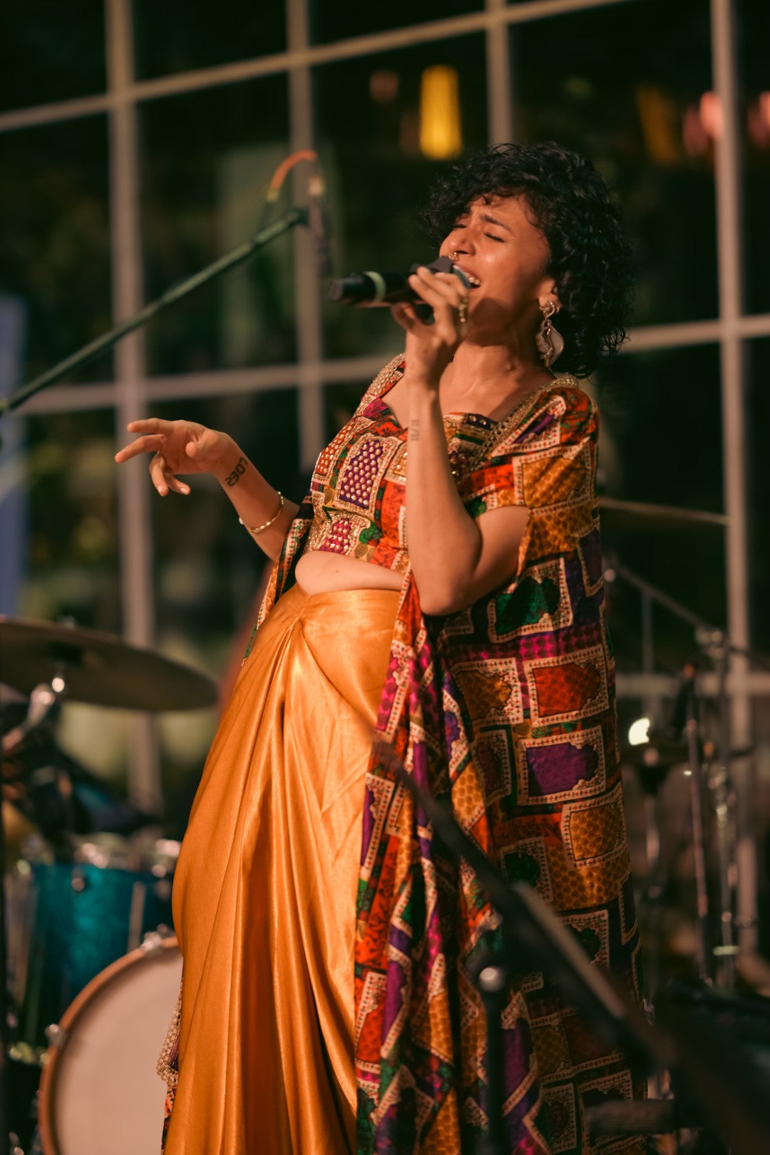 Maalavika Sundar at Concert in our Liquid Gold Cape & Dhoti Set