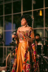 Maalavika Sundar at Concert in our Liquid Gold Cape & Dhoti Set