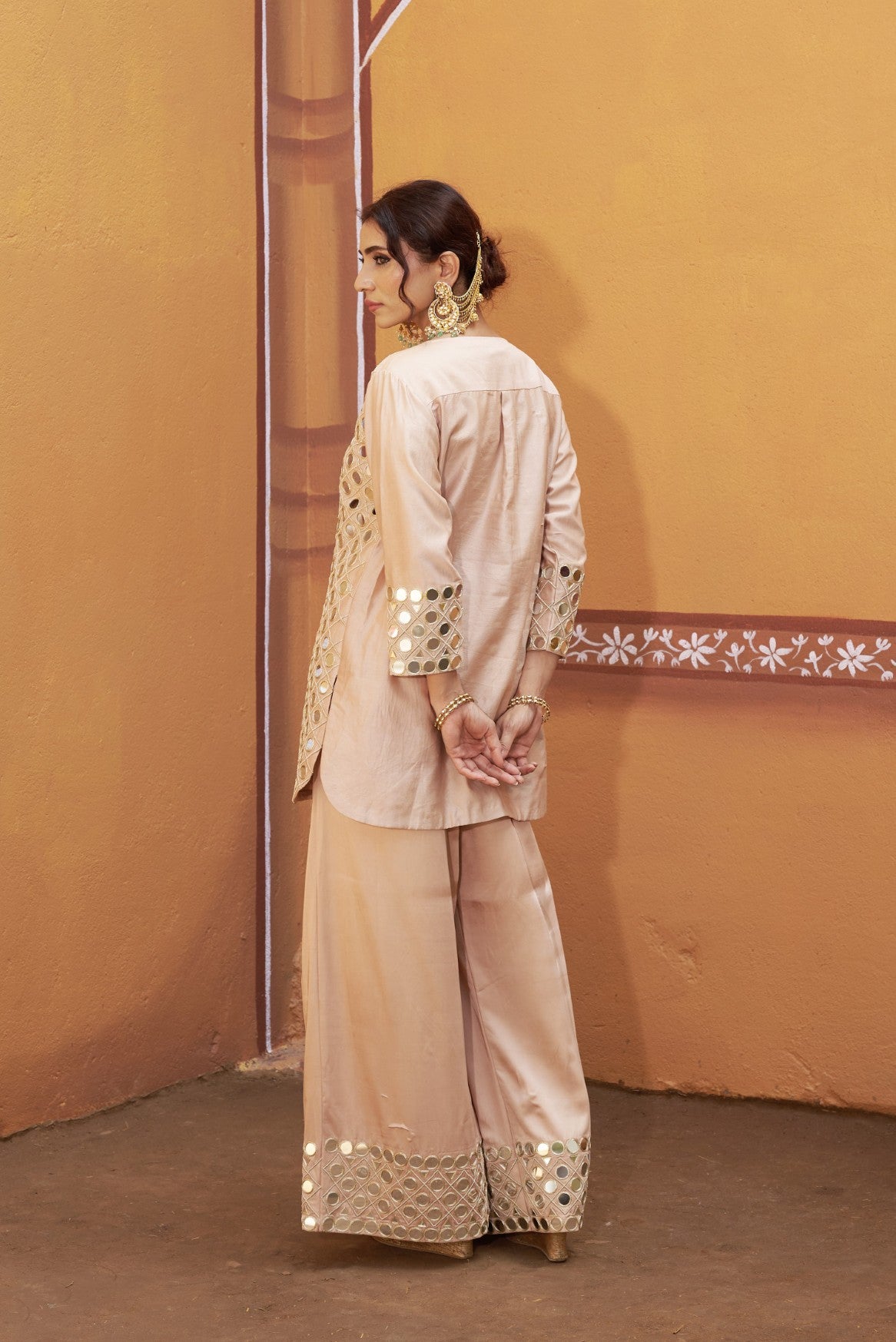 Fully hand embroidered short cris cross kurta with pleated pants