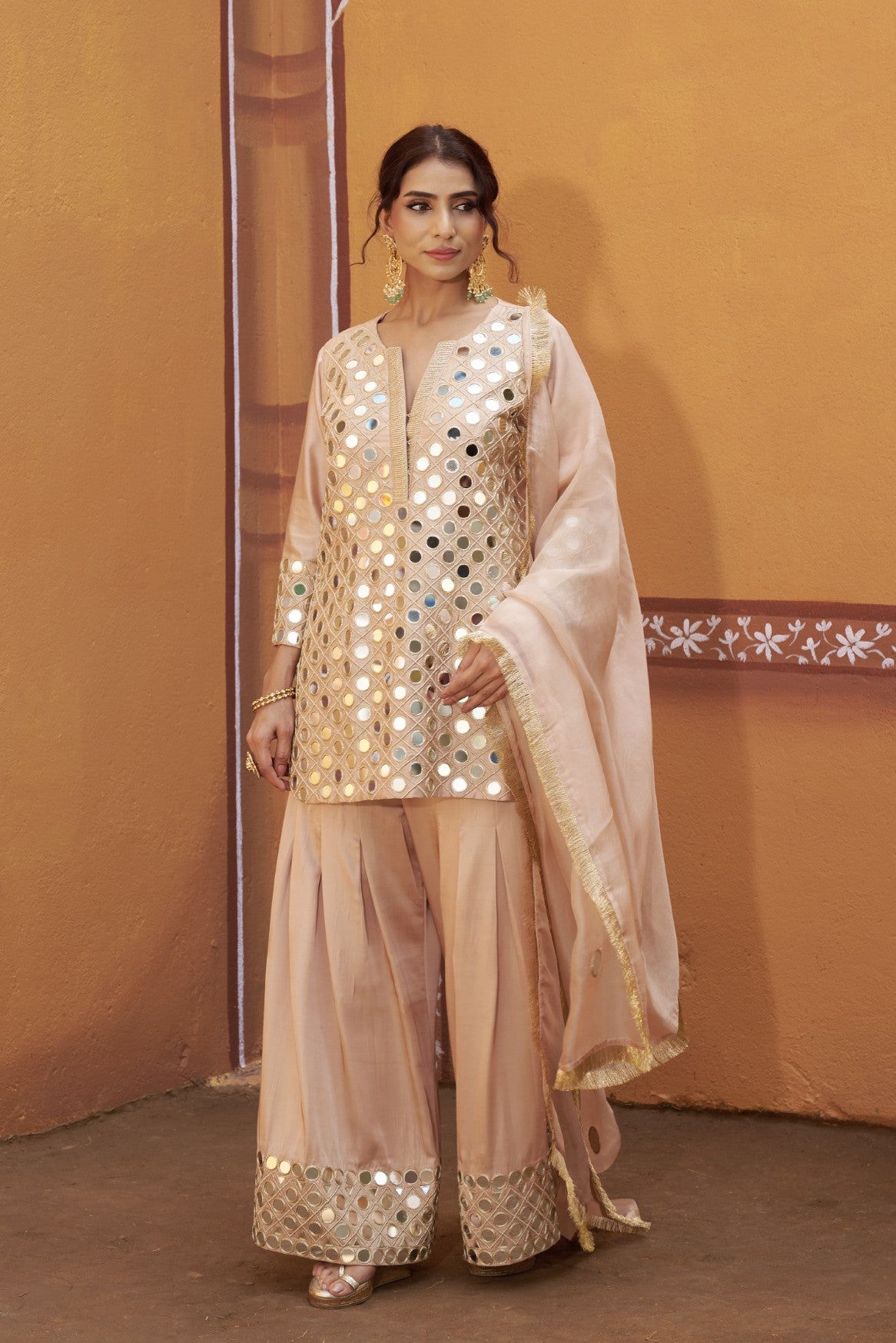 Fully hand embroidered short cris cross kurta with pleated pants