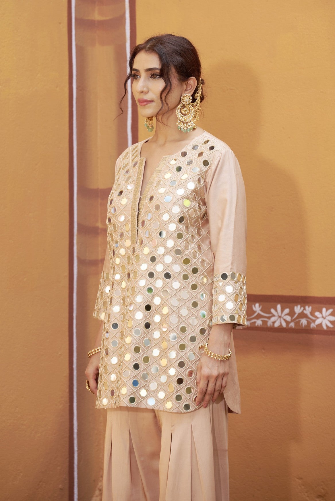 Fully hand embroidered short cris cross kurta with pleated pants