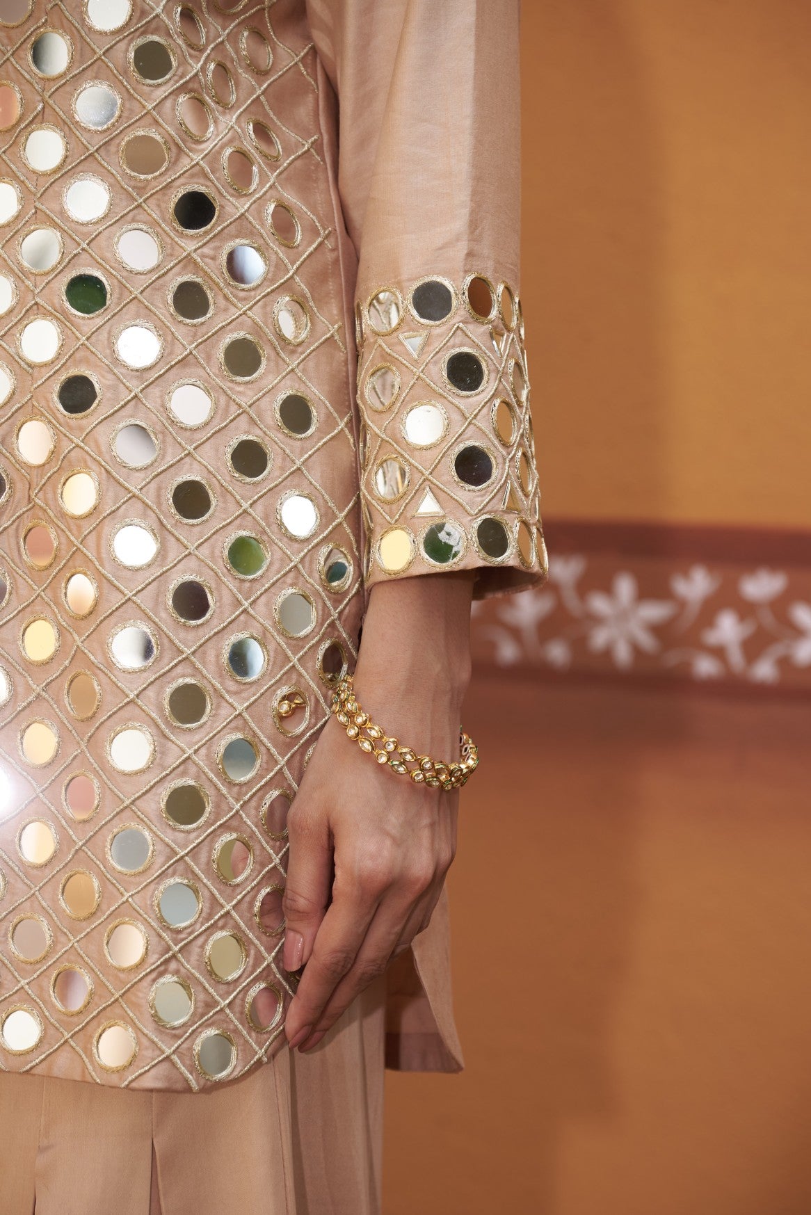 Fully hand embroidered short cris cross kurta with pleated pants