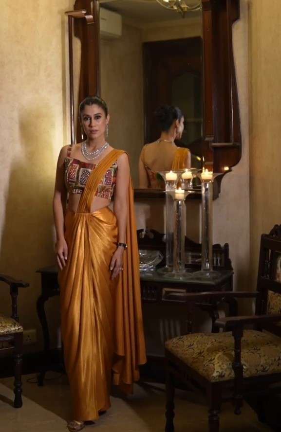 Celebrity Navneet Randhawa in our Hand embroidered blouse with pre draped liquid gold saree image 4