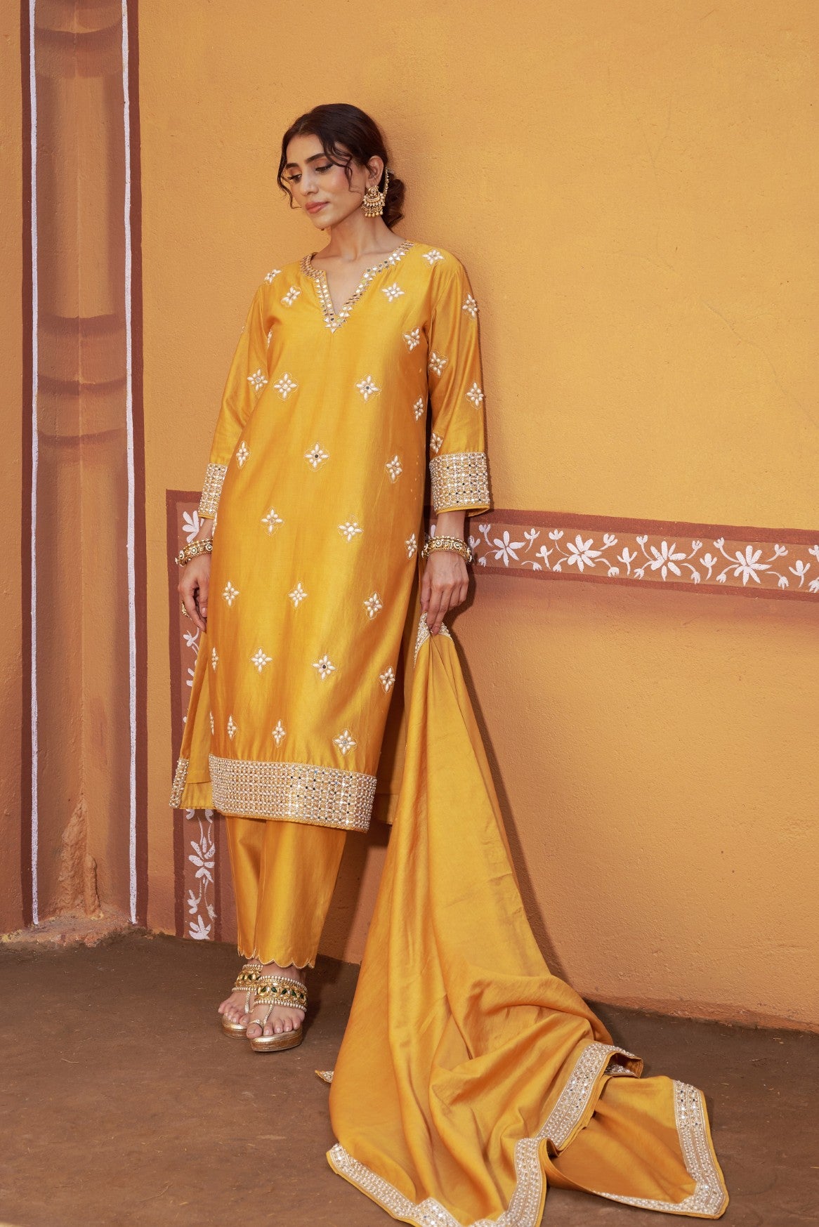 Golden yellow hand embroidered mirror work kurta set image 0