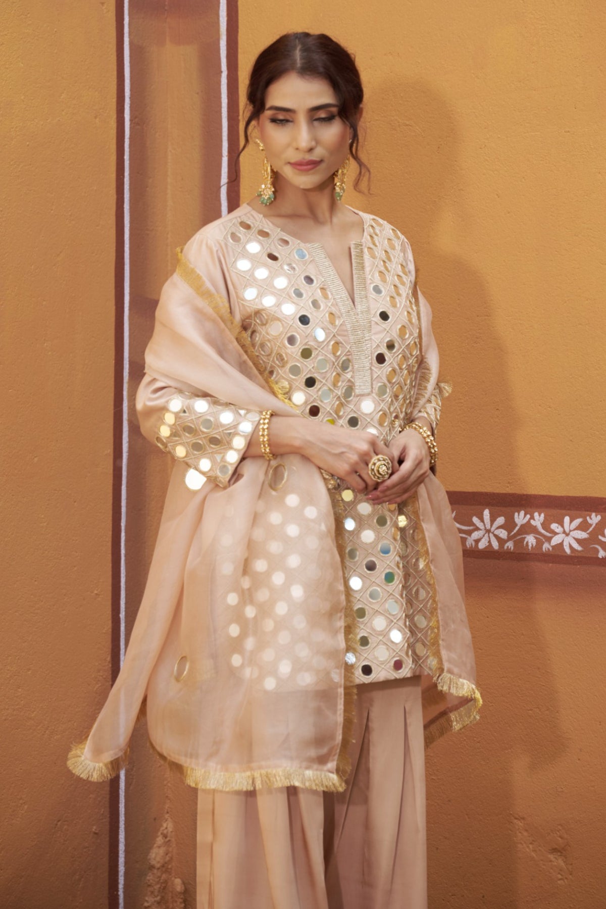 Fully hand embroidered short cris cross kurta with pleated pants