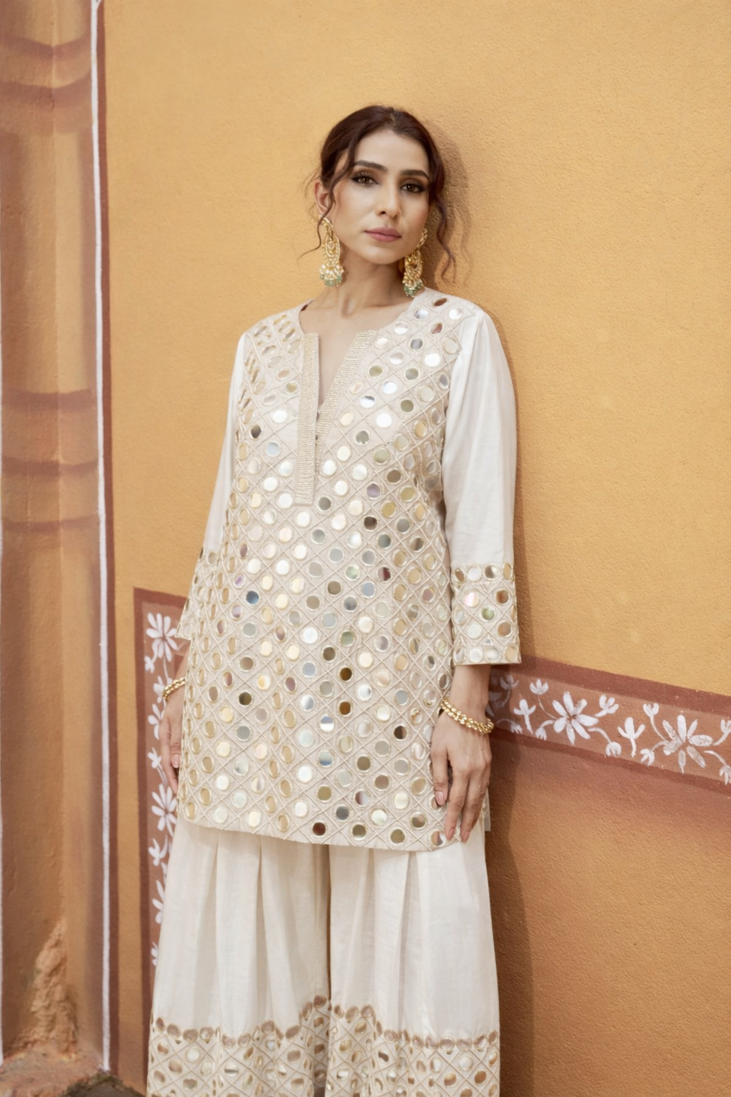 hand embroidered short cris cross kurta with pleated pants